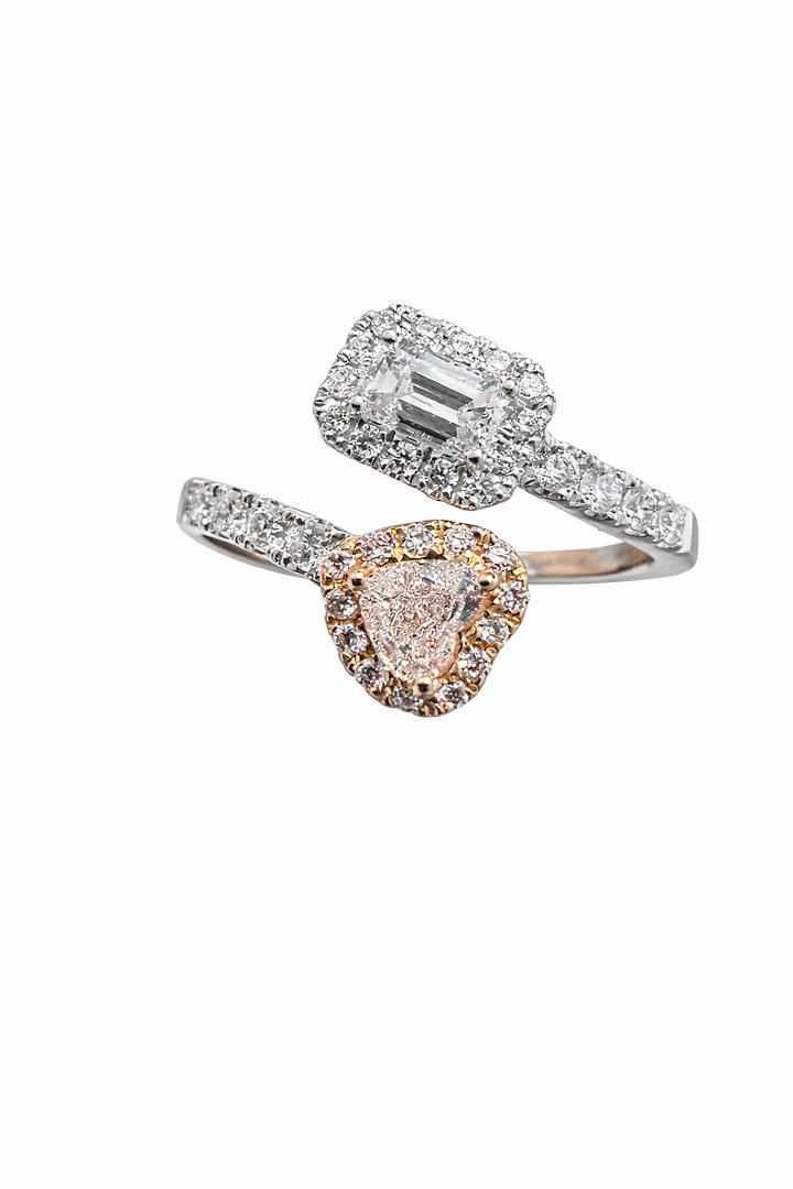 A contemporary open-design ring with pink and white diamond