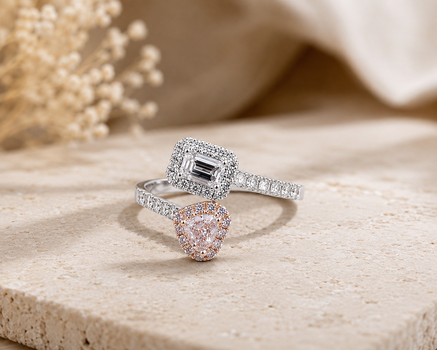 A contemporary open-design ring with pink and white diamond